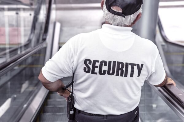 security, man, escalator, police, guard, officer, surveillance, control, monitoring, safety, uniform, back view, security, security, security, security, security, police, safety